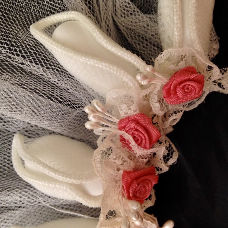 éVantail de mini roses et dragées